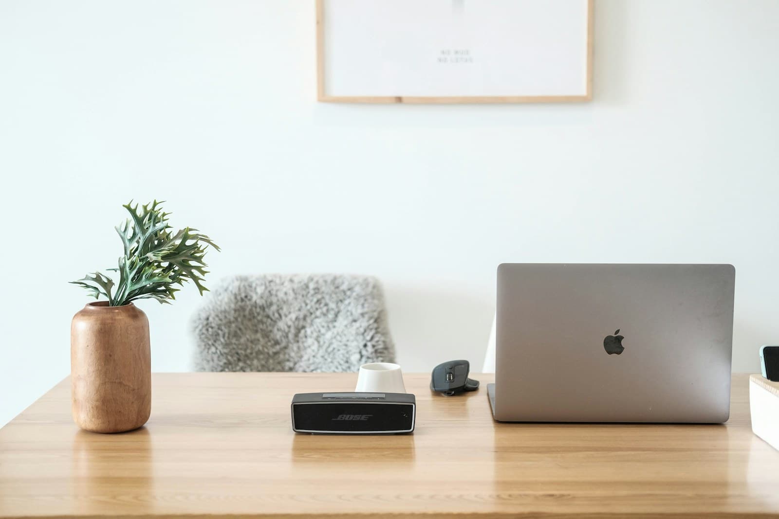 Workspace with laptop and notes